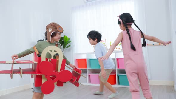 Mixed race Group of young children student playing together in school.