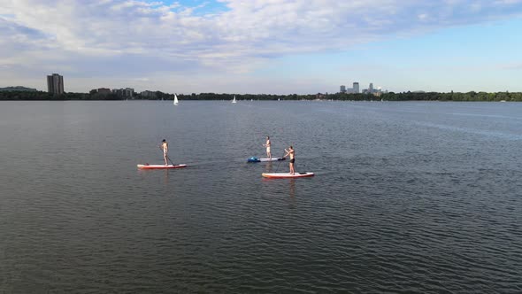 Paddle at lake calhound bde maka ska in minneapolis during summer time