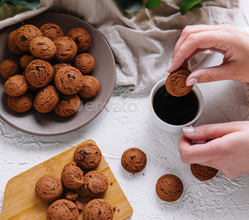 Enjoying freshly baked cookies with coffee