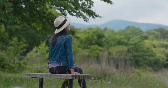 Woman Look at The Lake in Countryside