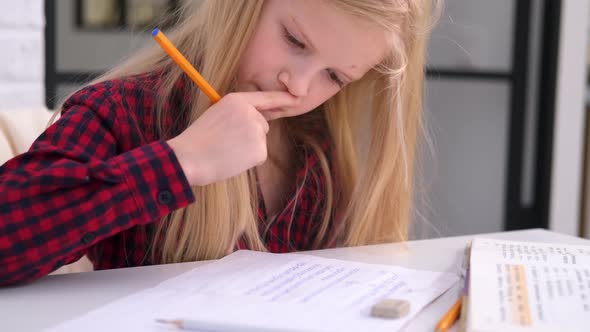 Blonde Schoolgirl Studying at Home Doing School Homework