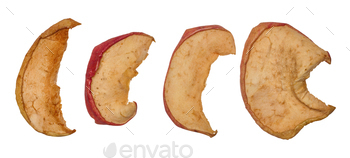Dried apple slices on isolated background