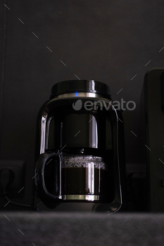 Modern coffee machine making coffee in the morning.