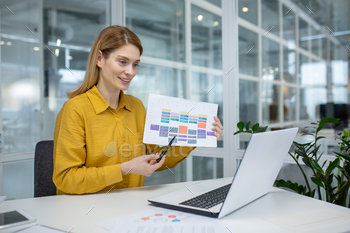 Professional woman presenting a color-coded schedule in a modern office setting