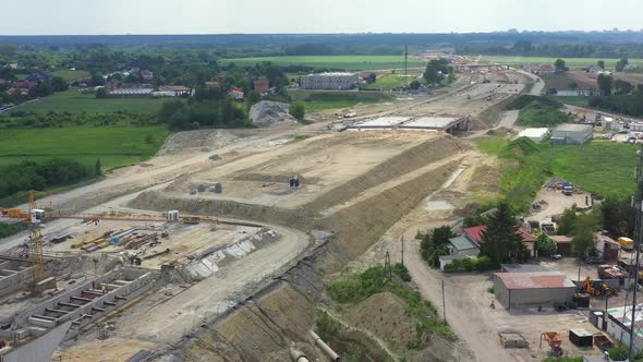 Road construction. View from above bridge construction over car highway