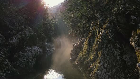 River in a Narrow Canyon with White Rocks