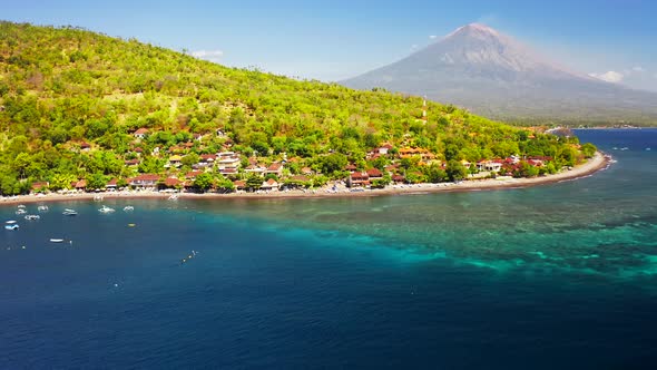 View of the Mountain Agung Volcano and Clear Azure Sea Bay in Jemeluk Bay, Amed Beach, Bali