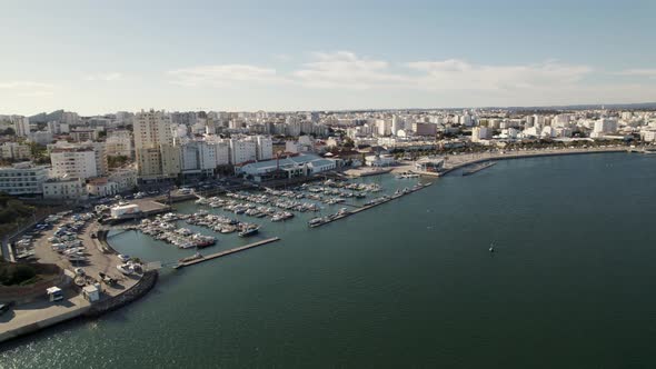 Aerial panorama view Portimão Nautical Port on Shore Arade River, Residential Buildings Cityscape