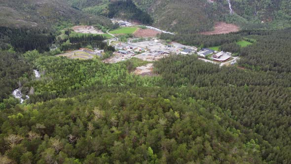 Secret industrial area hidden far inside the deep woods of Kinsarvik Hardanger - Aerial from mountai