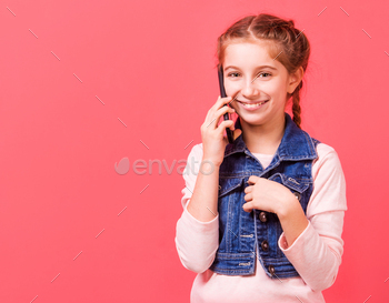 Little girl speaking on the phone