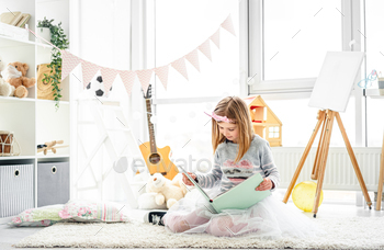 Beautiful girl reading intersting book