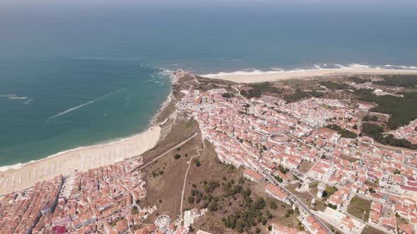 Panoramic of Nazare beach and town, Silver Coast, Portugal. Aerial view