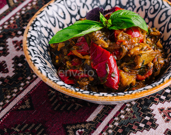 Authentic spicy aubergine stew in traditional bowl