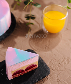 Holographic cake slice with orange juice