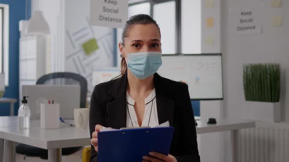 Business Woman with Face Mask During Online Web Internet Videocall