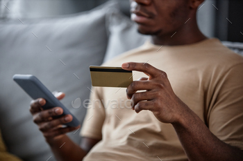 Man Paying For Goods In Online Shop