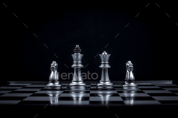Chess board game in silver team show strategy game as business Challange competitive game ,chessboar