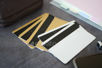 close up of credit cards on wooden background