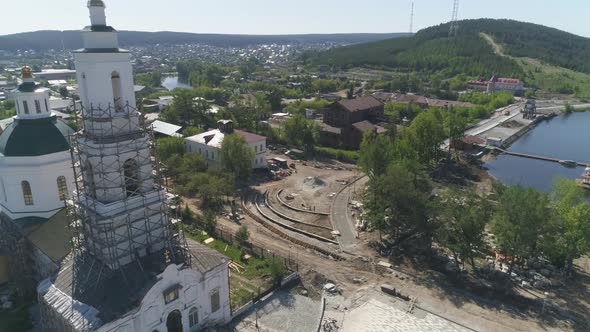 Aerial view of reconstruction of old church and embankment 18