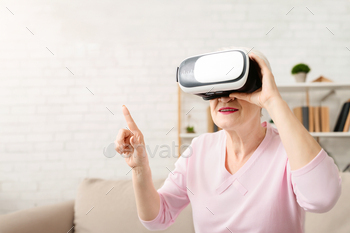 Woman in Pink Shirt Using Virtual Device, Closeup