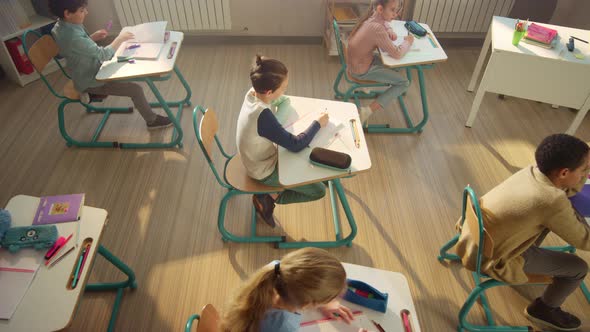 Pupils Learning in Classroom at School