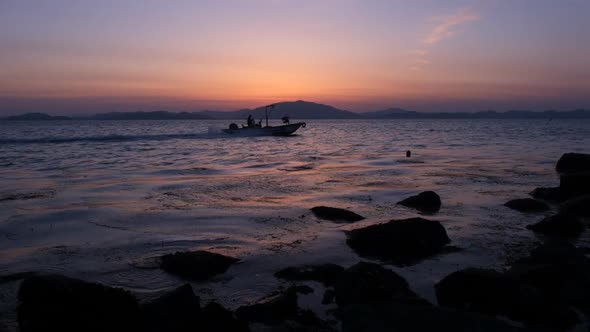 Boat Sails on the Sunset Sea in South Korea