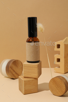 Cosmetic oil jars with wooden figurines