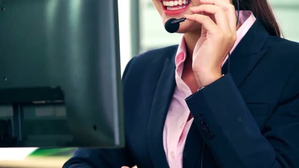 Business People Wearing Headset Working in Office