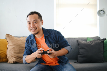 Man Playing Video Games With Joystick