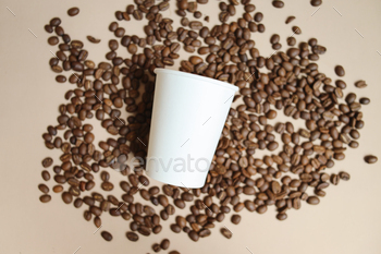 Coffee Cup On Coffee Beans