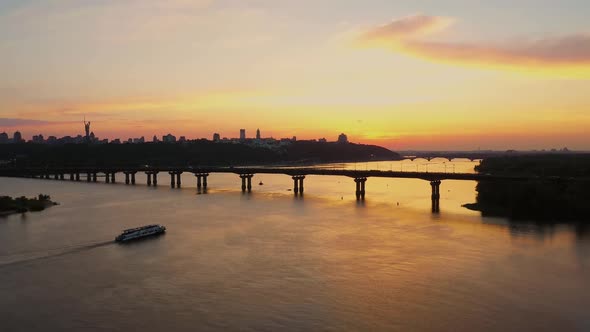 Evening City Scape View From Drone with a Huge River