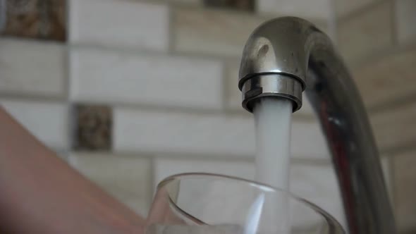 Pooring Water Into Glass