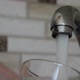 Pooring Water Into Glass - VideoHive Item for Sale