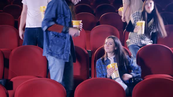 People Start Watching a Movie at the Cinema