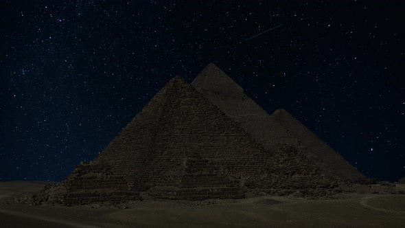 Pyramid Complex in Egypt Under Night Sky