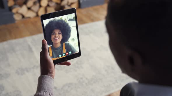 African American Man Video Calling Girlfriend on Digital Tablet