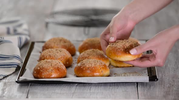 Freshly Baked Yeast Buns with Crumble on Baking Sheet. Sweet Bread.