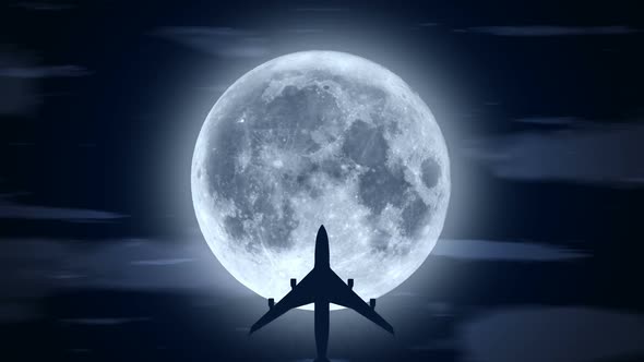 Passenger Airplane Over Moon in Cloudy Night