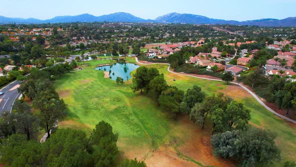 Golf Club with pond shot from above