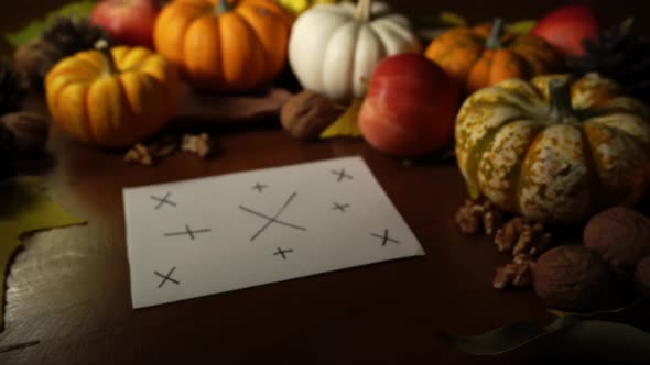 Macro Footage of Template Card with Tracking Points Lying on the Table with Autumn Composition