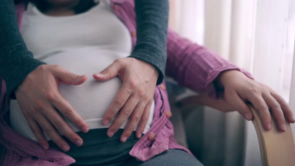 Pregnant Couple Feels Love and Relax at Home