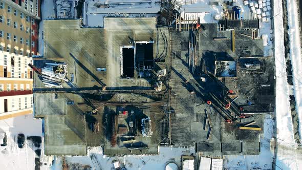 Aerial View of Unfinished Building on Construction Site.