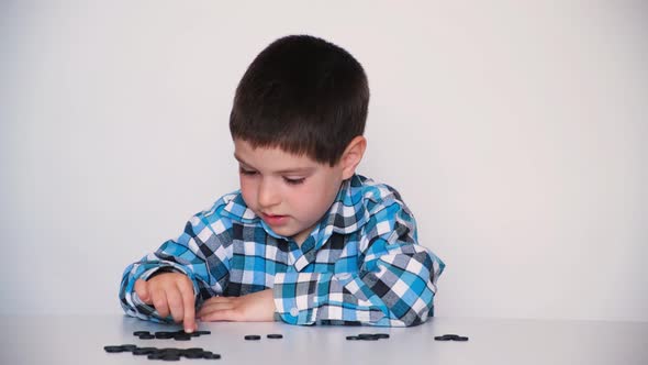 A 4Yearold Boy is Learning to Count Teaching Black Numeracy Chips for Preschoolers