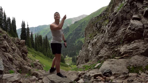 Guy in the Mountains Takes Off His Medical Mask.