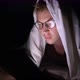 Young Handsome Scandinavian Man Using Digital Tablet in Dark Room - VideoHive Item for Sale