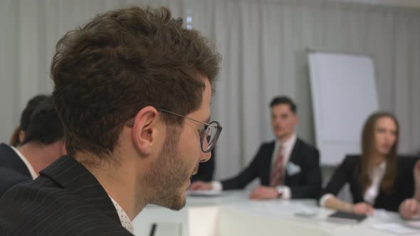 Close up of a businessman discussing in a meeting