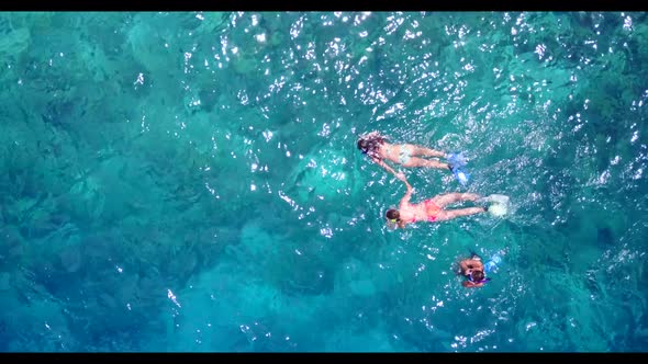 Aerial seascape of tropical sea view beach holiday by blue green water with white sandy background o