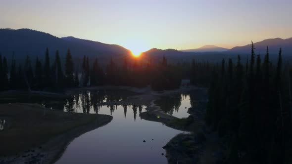 Sun rising at Sparks Lake, Oregon aerial view