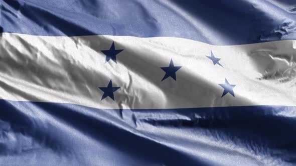 Honduras textile flag waving on the wind. Slow motion. 20 seconds loop.