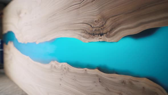 Beautiful Surface of a Wooden Slab Tabletop Filled with Epoxy Resin